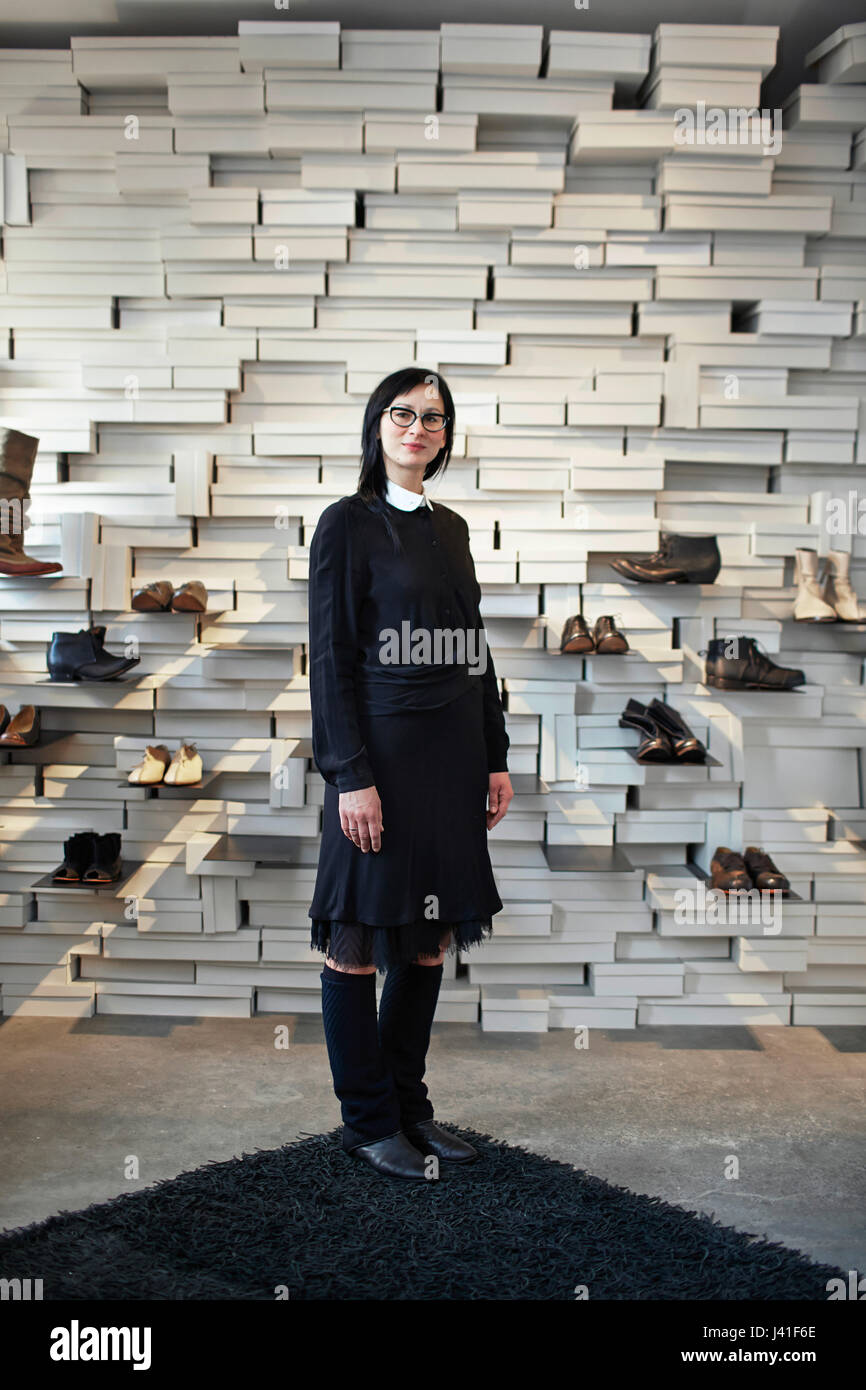 Shoe designer Elena Dobele in her shop ZOFA, Antonijas Iela 22, Art Nouveau quarter, Riga, Latvia Stock Photo