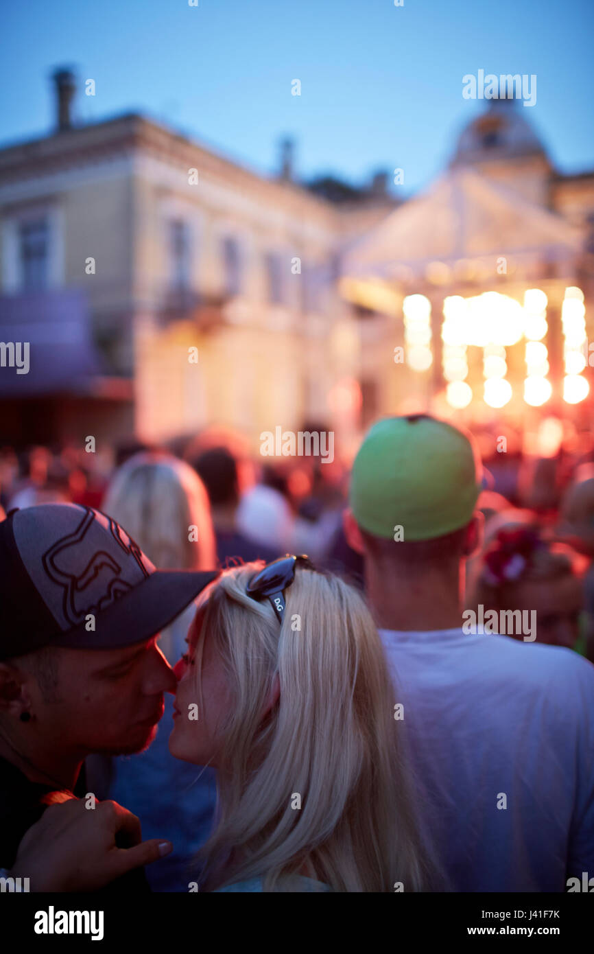 Kiss at a concert, summer fest in the garden of Piens (Milk Club), Briana Iela 9, Riga, Latvia Stock Photo