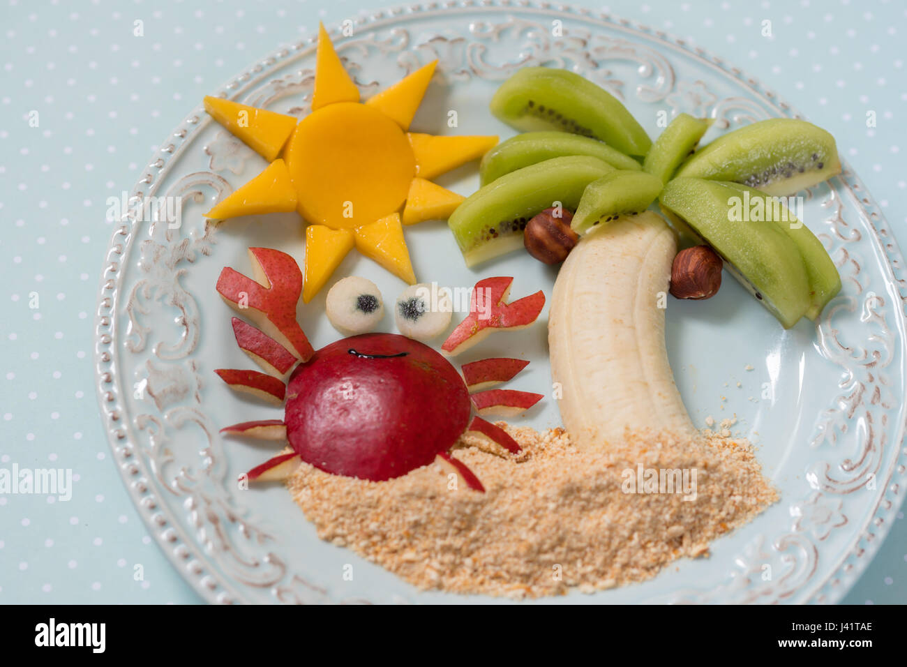 Fruit Dessert For Kid Child With Kiwi Banana And Pear Cute Crab On Beach With Palm Tree Stock Photo Alamy