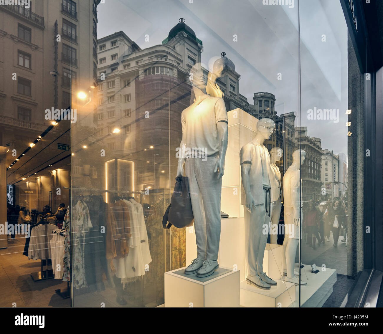 Mannequins and reflections at a window shop in Gran Via avenue. Madrid. Spain Stock Photo Alamy