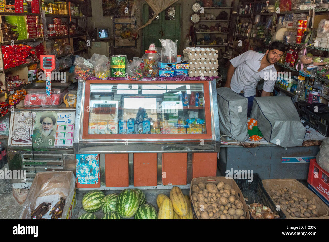 Young Man Keeping A Local Grocery Store, Esfidan, A Traditional Rural Village, North Khorasan Province, IRAN Stock Photo