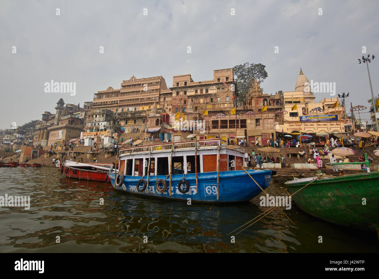 Ganges river, Varanasi, on boat cruise on the river Ganges to observe the way of life of the pilgrims by the Ghats. Stock Photo