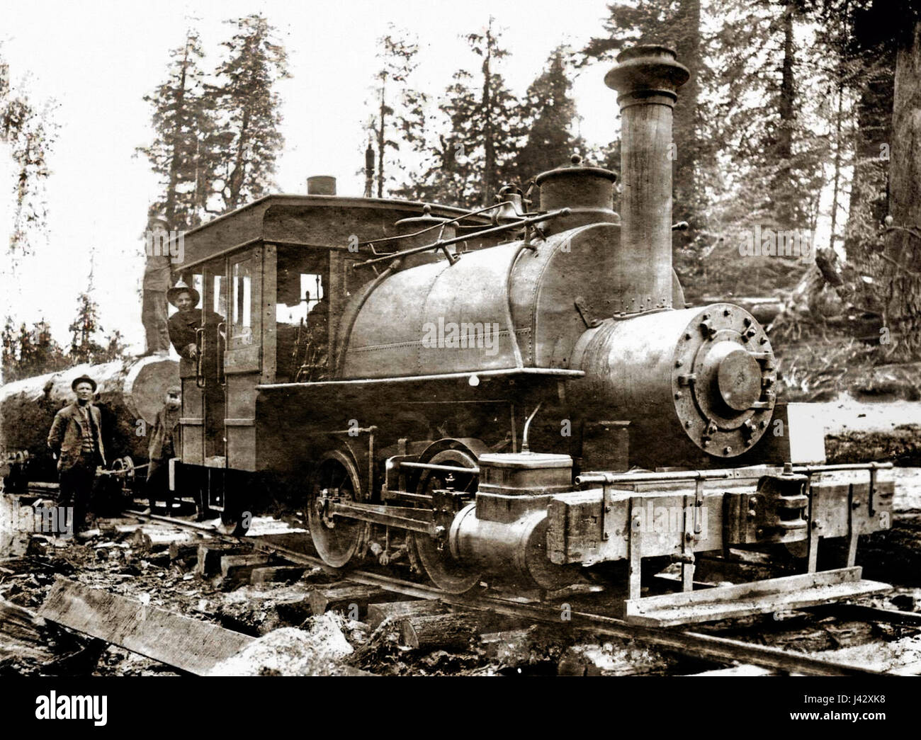 A Photograph Or Historical Representation Of A Logging Steam Locomotive 