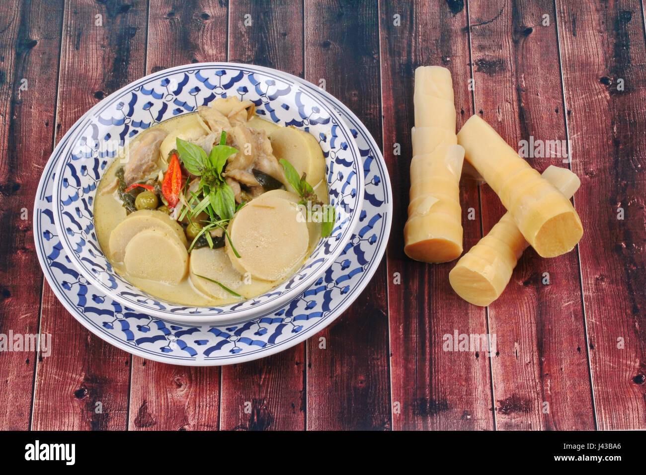 Thai recipe, Green chicken curry in coconut milk with soft bamboo pole