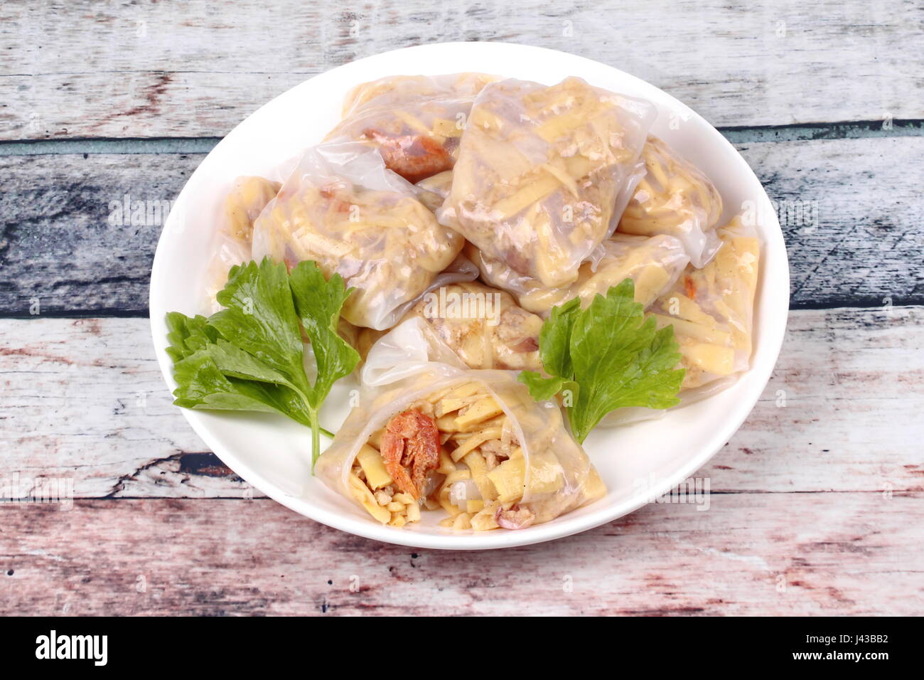 Chinese dessert, Steamed Dumpling stuffed with fried soft bamboo pole shoots,dried shrime and mined pork . Stock Photo