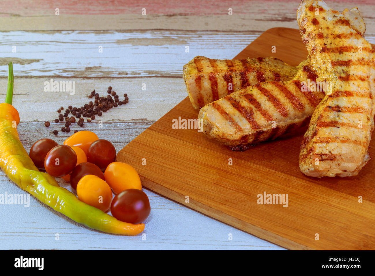 pepper pork steak tomatoes chops, homemade dinner Stock Photo Alamy