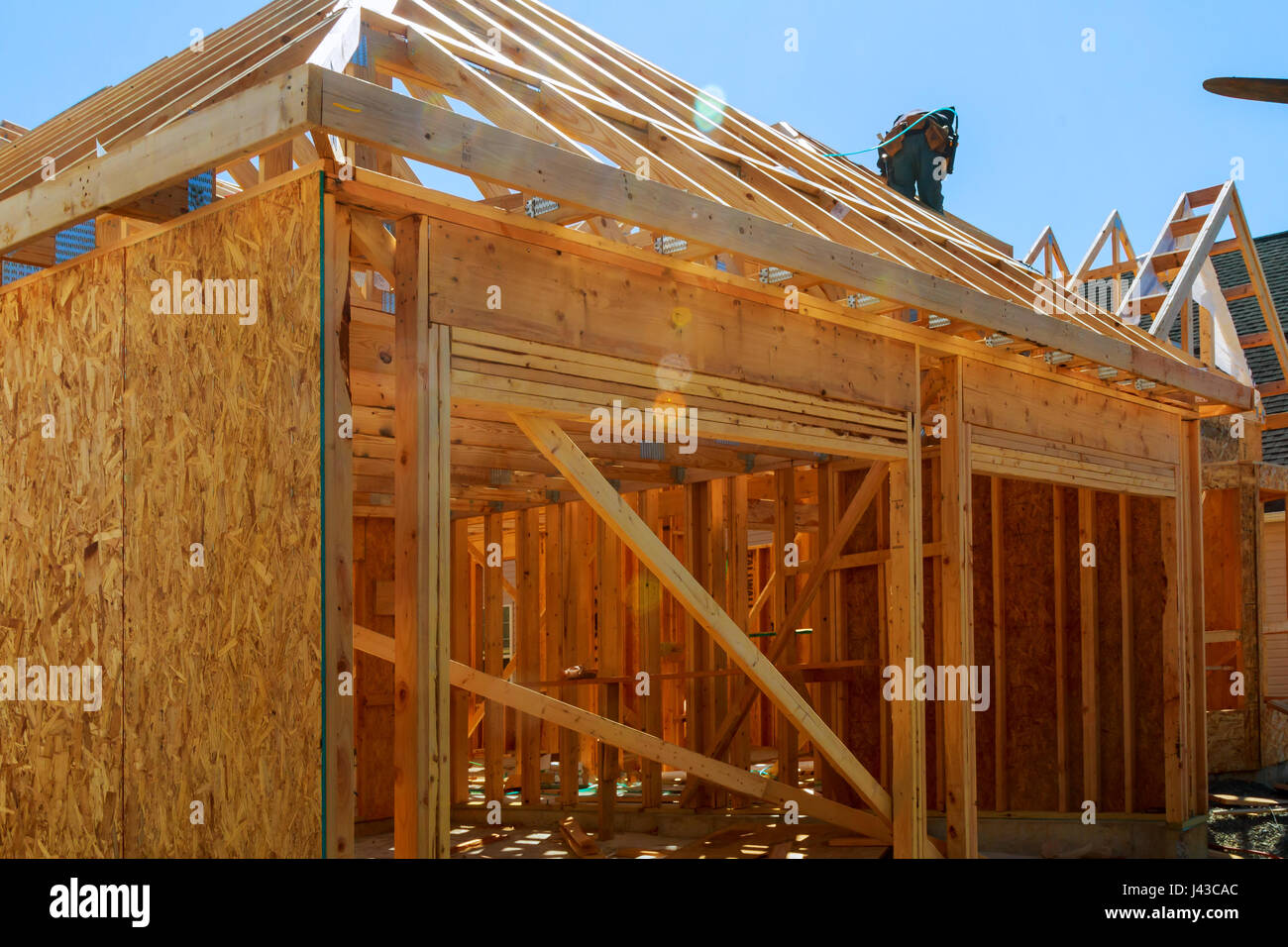 New construction of a house Framed New Construction of a House Building a new house from the ground up Stock Photo