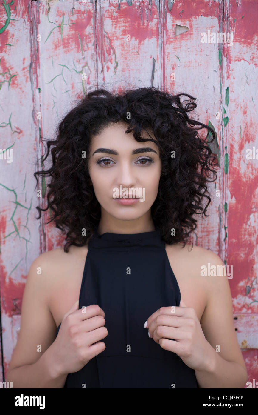 Dark curls curly hair hi-res stock photography and images - Alamy