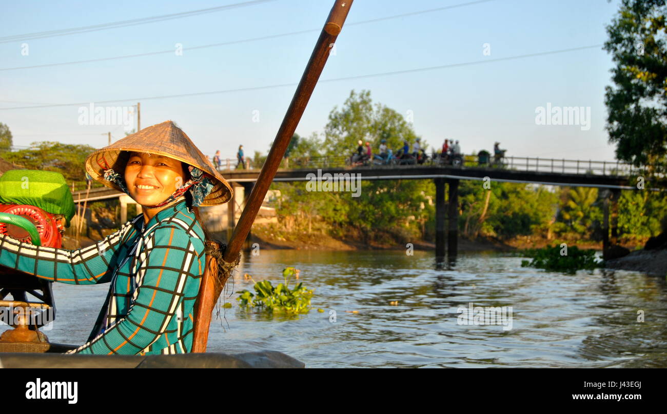 Smiley Boat Lady in the Mekong Delta Stock Photo
