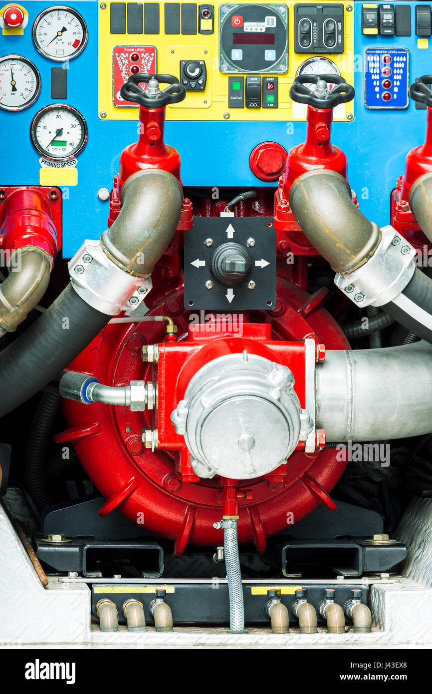 fire pump panel on fire engine with valves and pressure gauges Stock