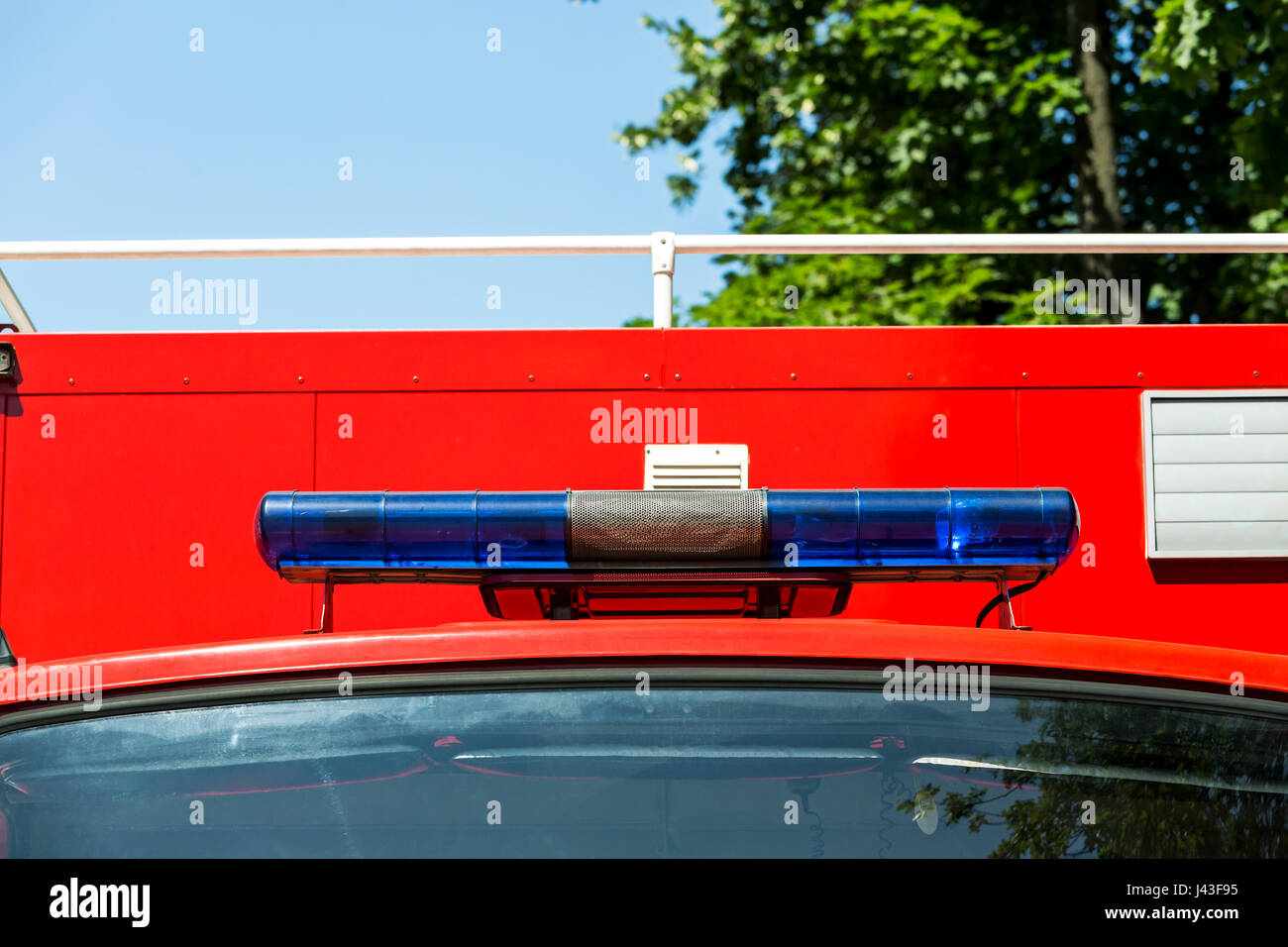 blue flashing lights and siren on a fire truck Stock Photo