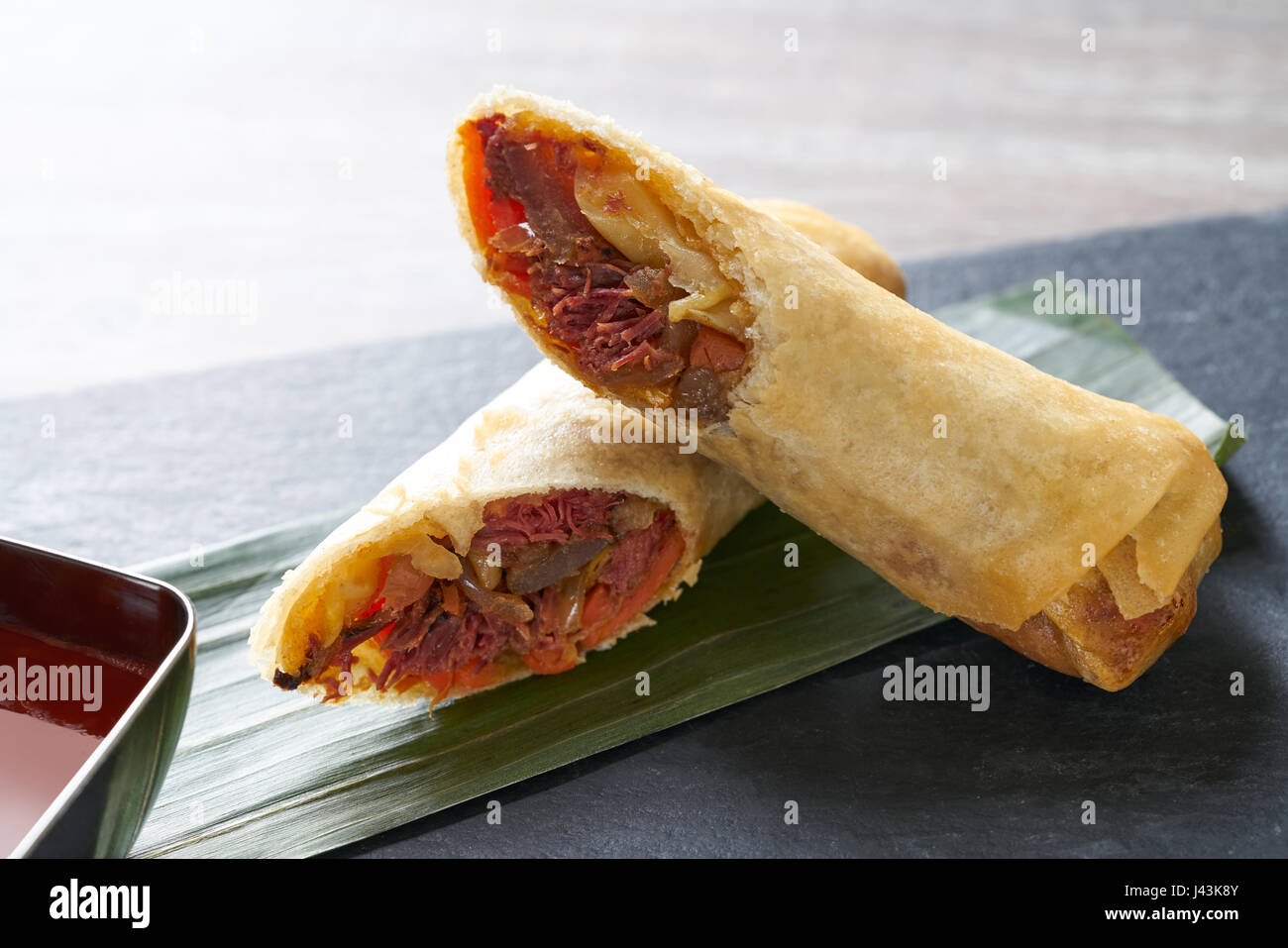 Duck rolls with sweet and sour sauce Asian cuisine recipe Stock Photo