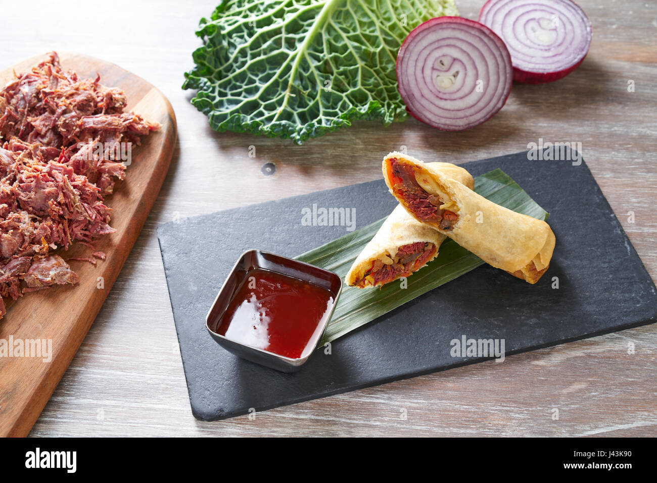 Duck rolls with sweet and sour sauce Asian cuisine recipe Stock Photo