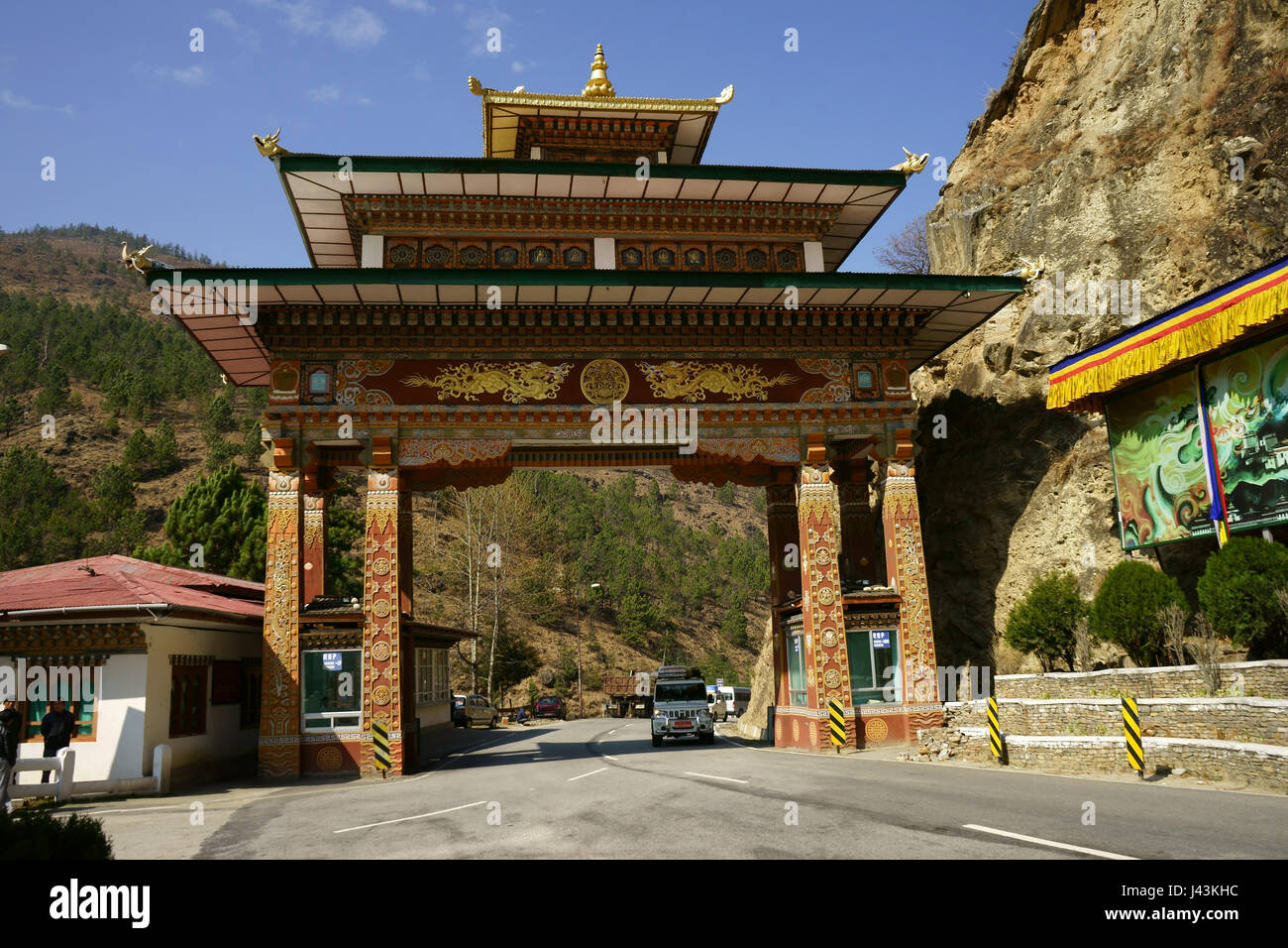 Gate over road to Thimphu at intersection with Paro road, Bhutan Stock Photo