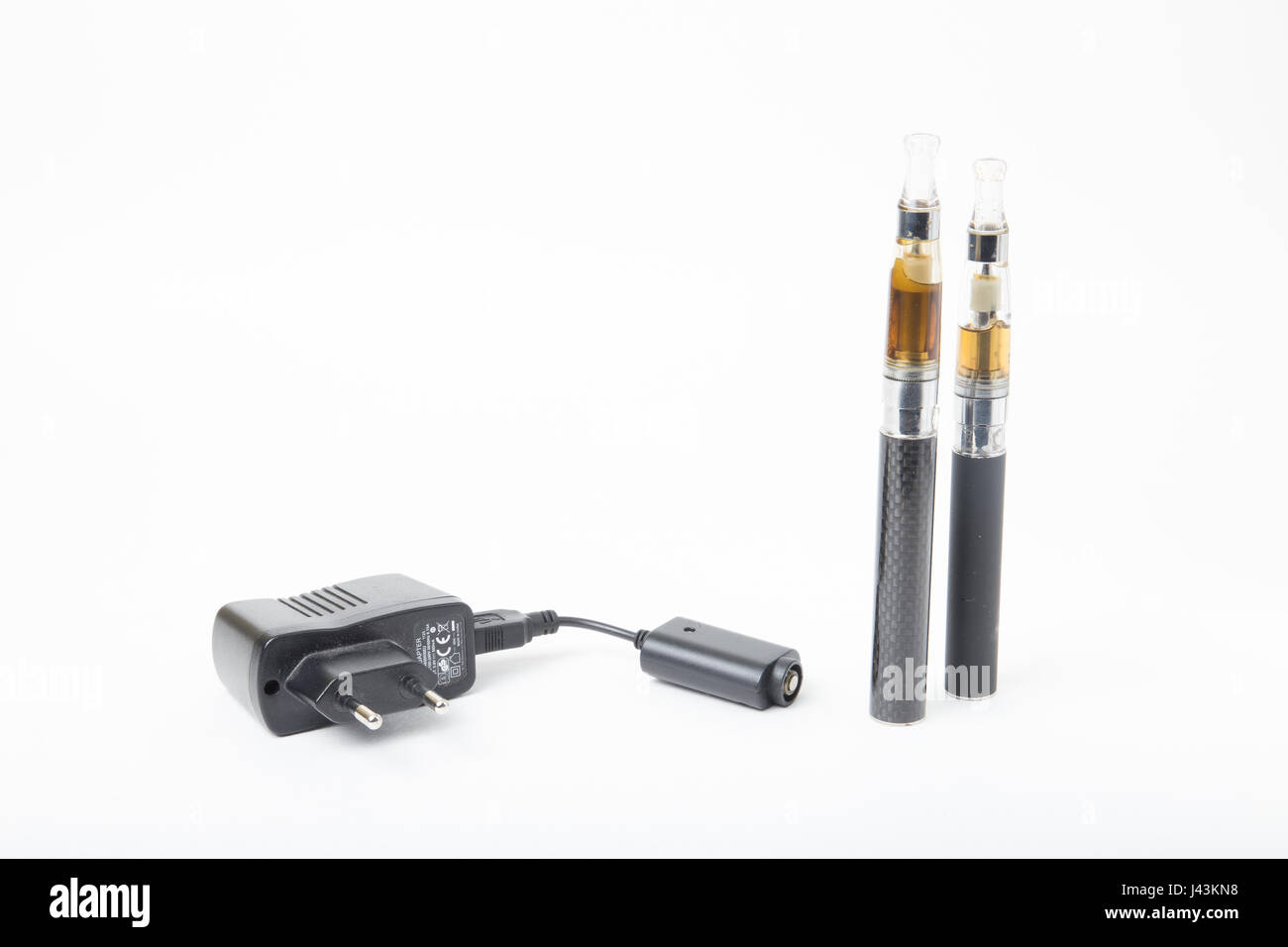 Thin black electric cigarettes with USB  charger Stock Photo