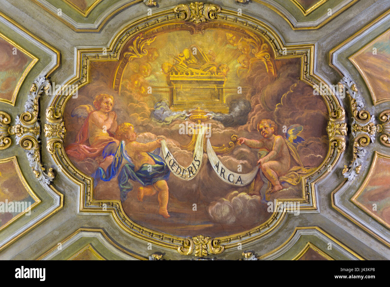 TURIN, ITALY - MARCH 14, 2017: The ceiling fresco of angels with marianic inscription of litany and the Ark of the Covernant in church Chiesa di San F Stock Photo