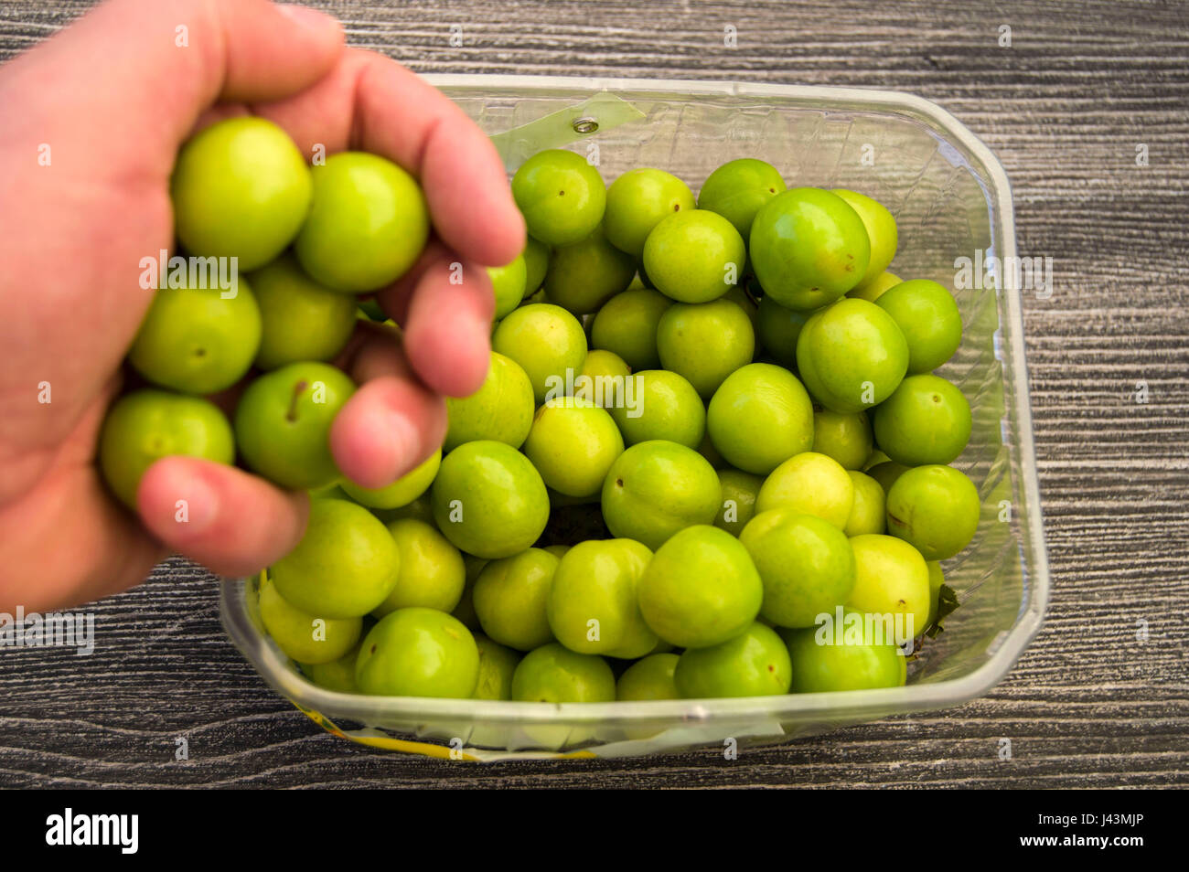 A handful of sour plums, Salt and plum food is very tasty. There are a