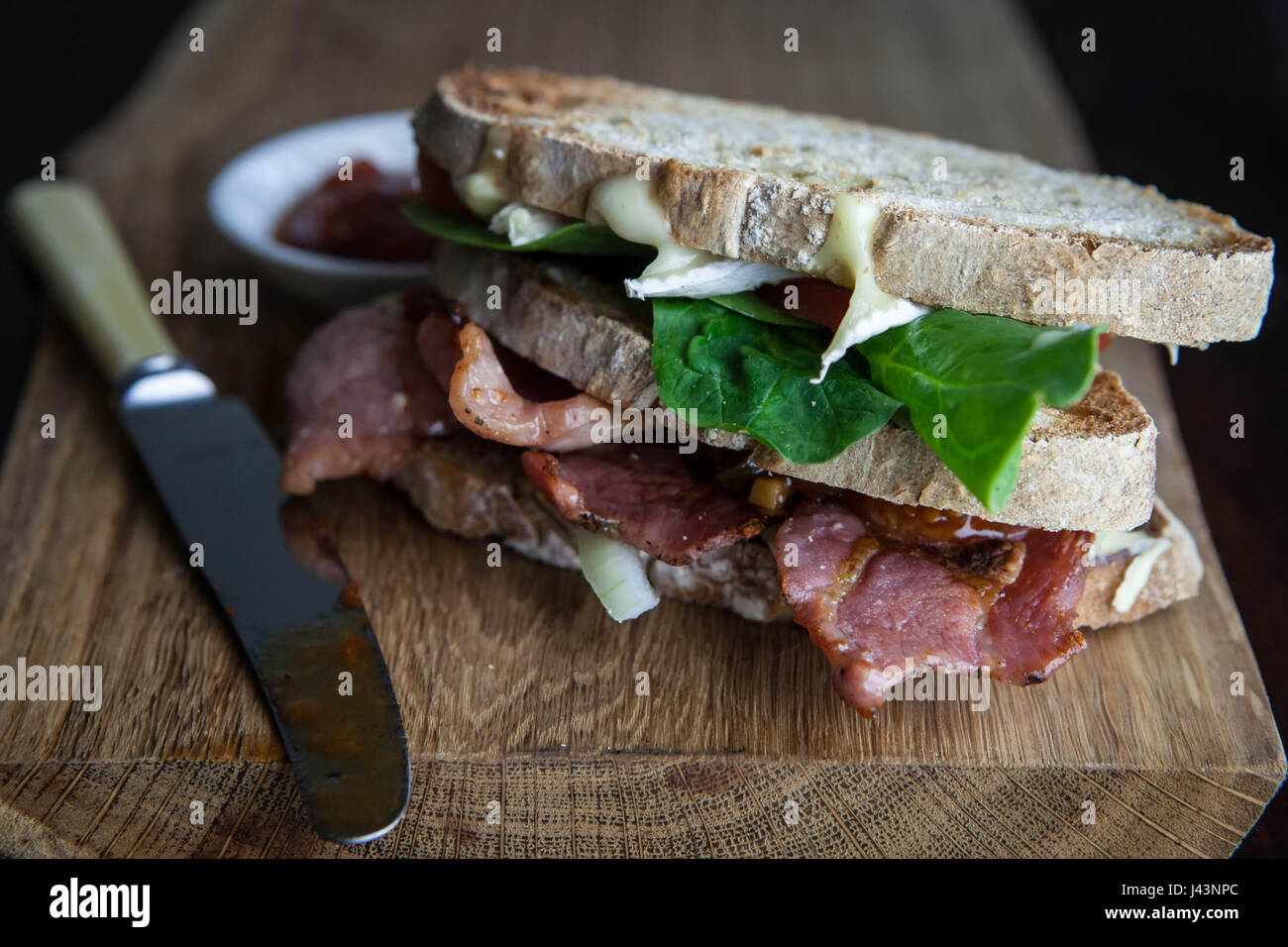Ultimate bacon and brie sandwich Stock Photo Alamy