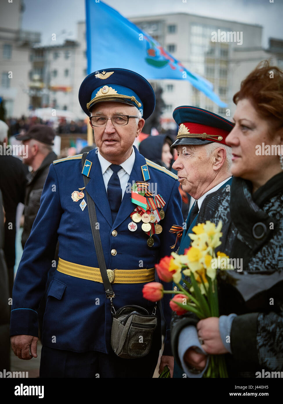 Vitebsk, Belarus. 9th May, 2017. The procession along the main street of the city. Participate in as the veterans of the great Patriotic war and young generation of Vitebsk. People give flowers to the elderly and lay wreaths at the monument 'Eternal Fire'. Credit: Alexey Vronsky/Alamy Live News Stock Photo