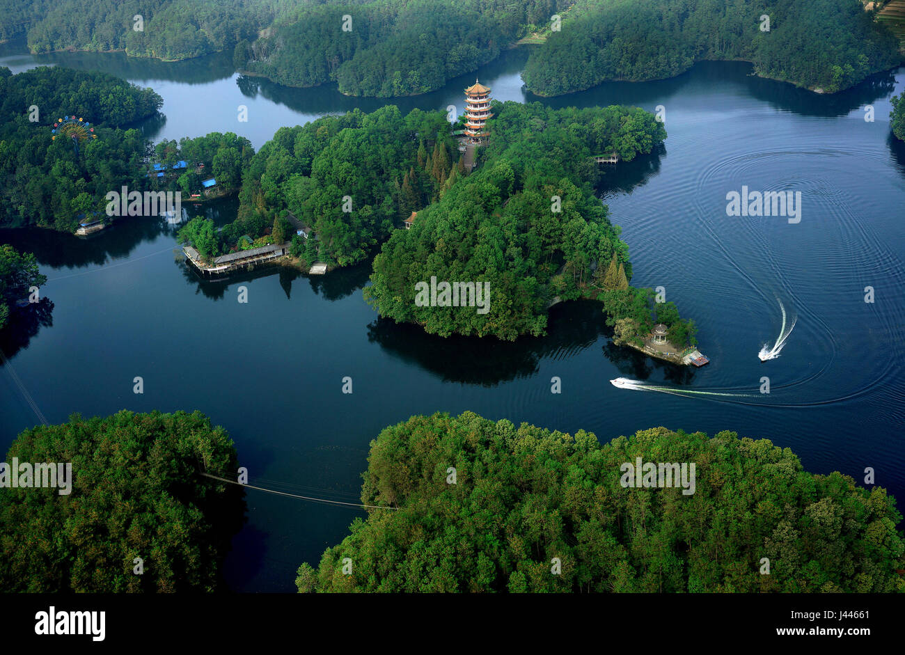 Hanzhong. 21st Oct, 2015. Photo taken on Oct. 21, 2015 shows the scenery of Nanhu Lake scenic spot in Hanzhong City, northwest China's Shaanxi Province. Hanzhong is the hometown of ancient Chinese General Zhang Qian, who opened up a trade route now known as the Silk Road some 2,100 years ago. Credit: Tao Ming/Xinhua/Alamy Live News Stock Photo