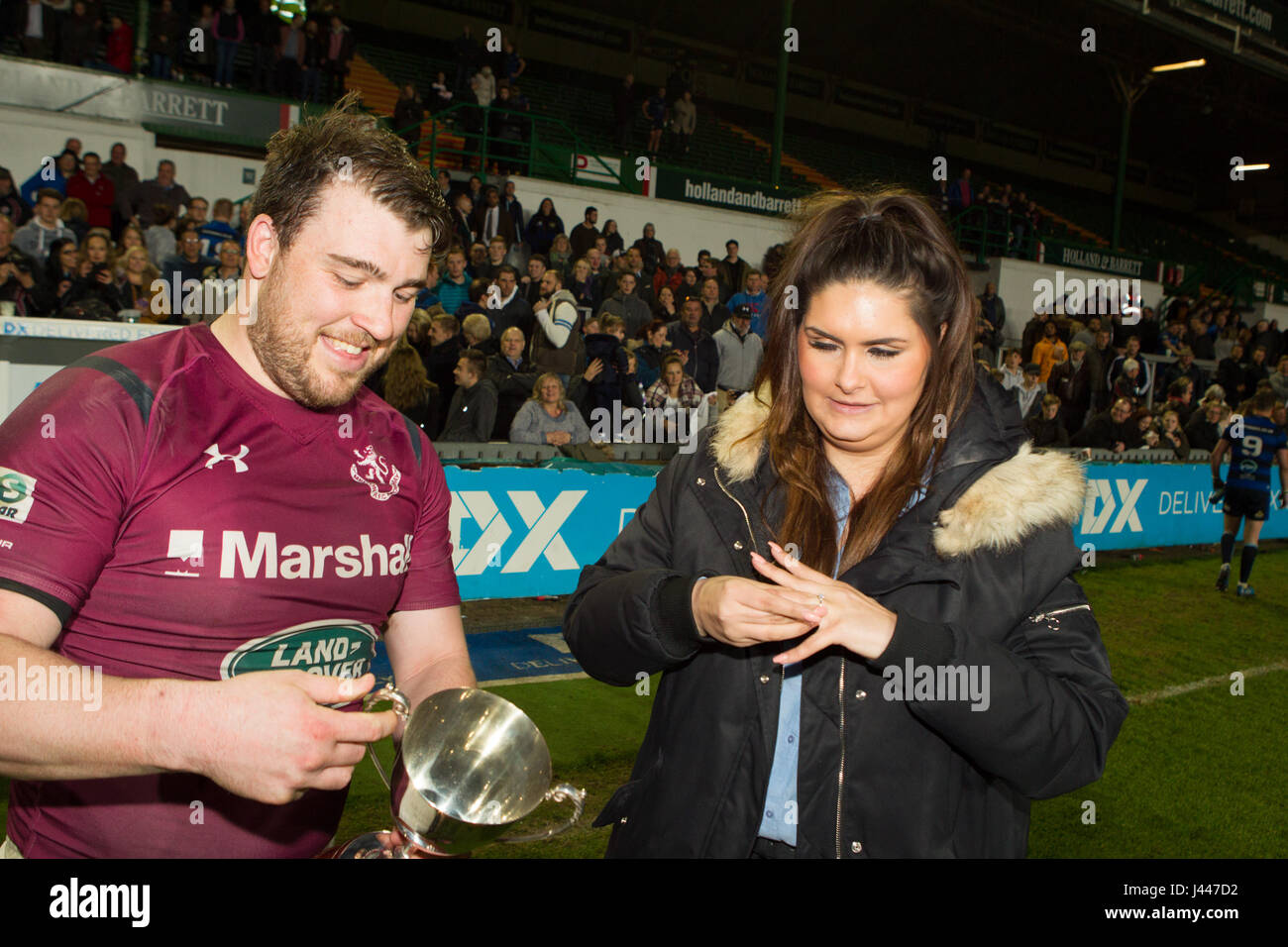 Leicester, UK. 9th May, 2017. Matt Cox proposes to girlfriend Beth immediately after his Melton Mowbray RFC team had won the Leicestershire RFU County Cup (Seniors) at Welford Road. Credit: Phil Hutchinson/Alamy Live News Stock Photo