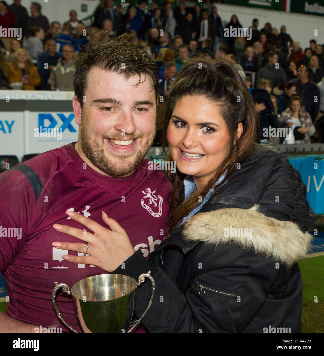 Leicester, UK. 9th May, 2017. Matt Cox proposes to girlfriend Beth immediately after his Melton Mowbray RFC team had won the Leicestershire RFU County Cup (Seniors) at Welford Road. Credit: Phil Hutchinson/Alamy Live News Stock Photo