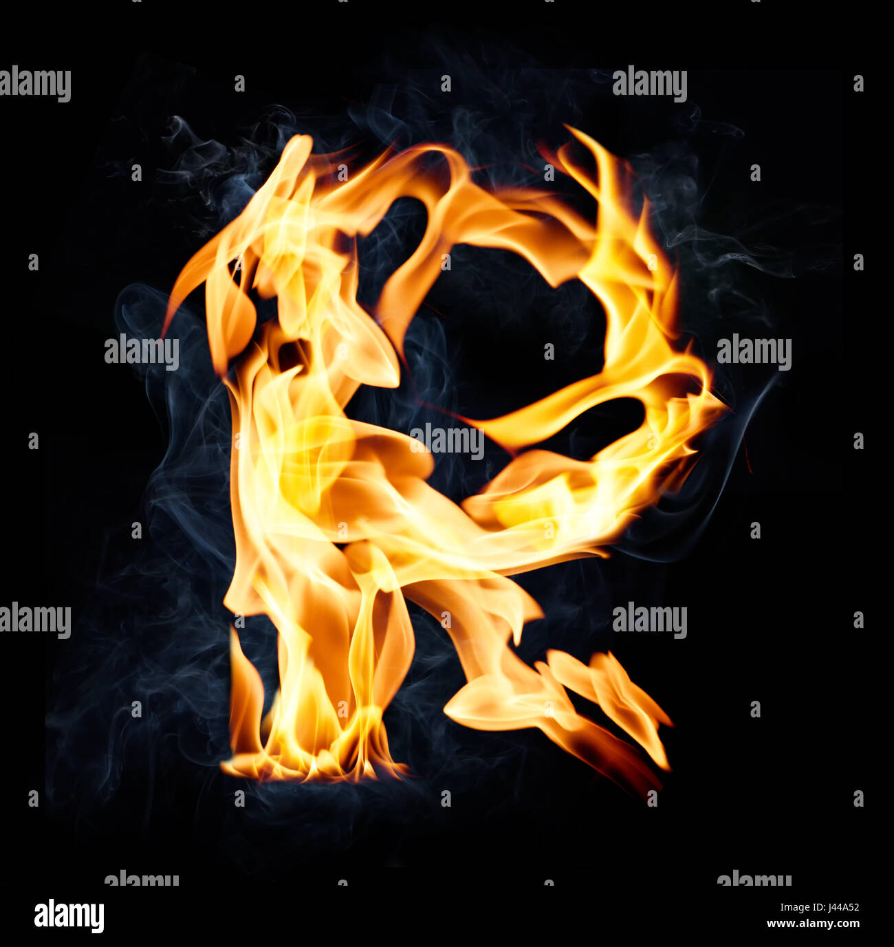 Letter R. Fire and smoke alphabet over black background Stock Photo - Alamy