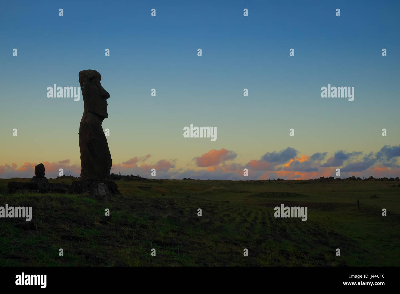 Moai statue ahu akapu at sunset, easter island, Chile Stock Photo