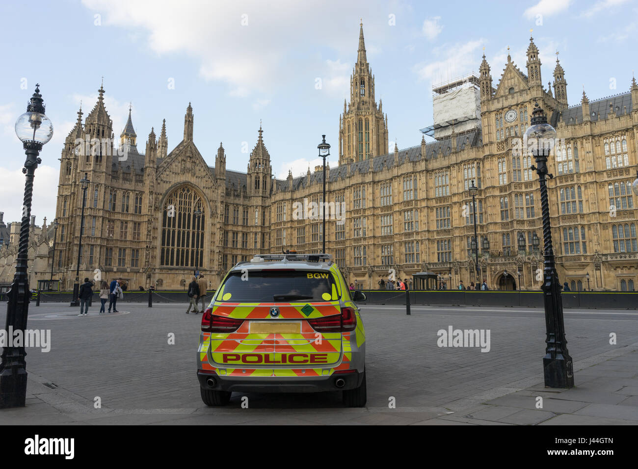 Police car providing high security outside the Houses of Parliament to help prevent a terrorist attack. Stock Photo