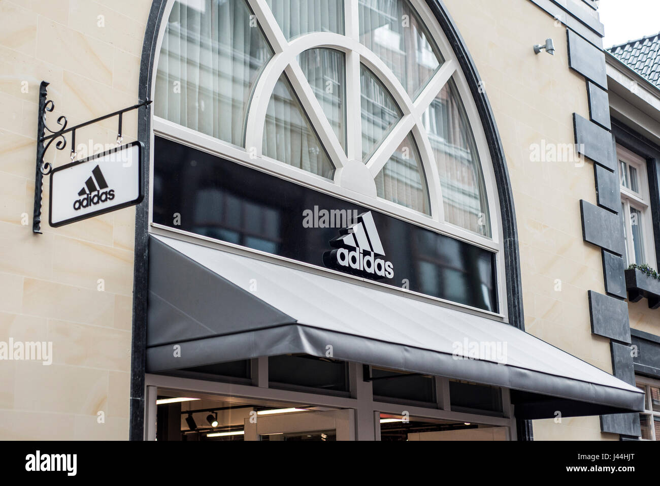 Roermond Netherlands 07.05.2017 - Logo of the adidas brick house Store in  the Mc Arthur Glen Designer Outlet shopping area Stock Photo - Alamy