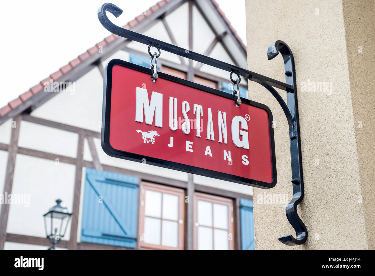 Roermond Netherlands 07.05.2017 - Logo of the Mustang jeans Store in the Mc  Arthur Glen Designer Outlet shopping area Stock Photo - Alamy