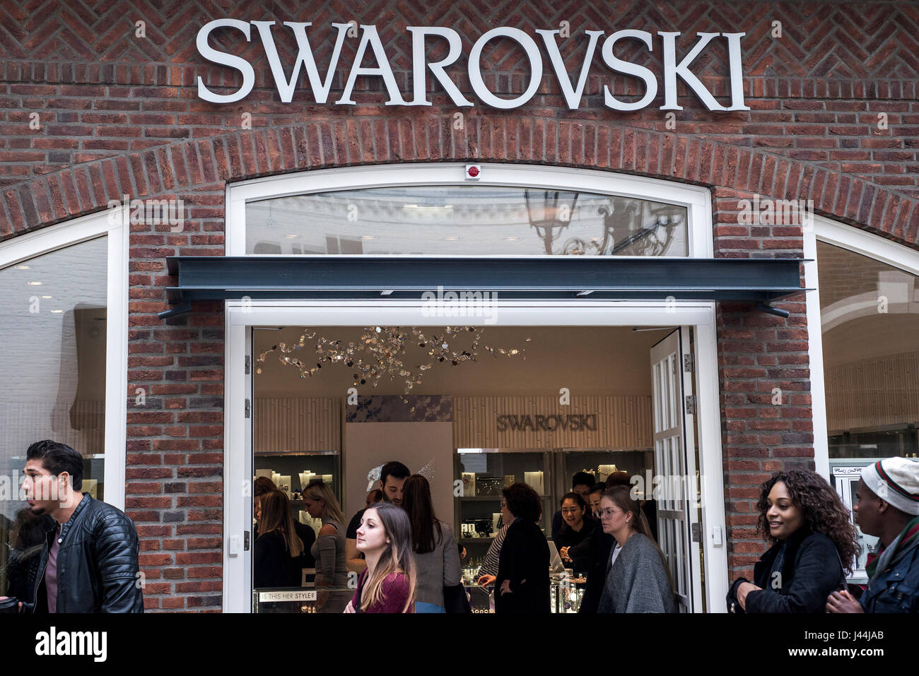 Roermond, Netherlands 07.05.2017 - Logo and shop of Swarovski Store Mc Arthur Glen Designer Outlet shopping area Stock Photo