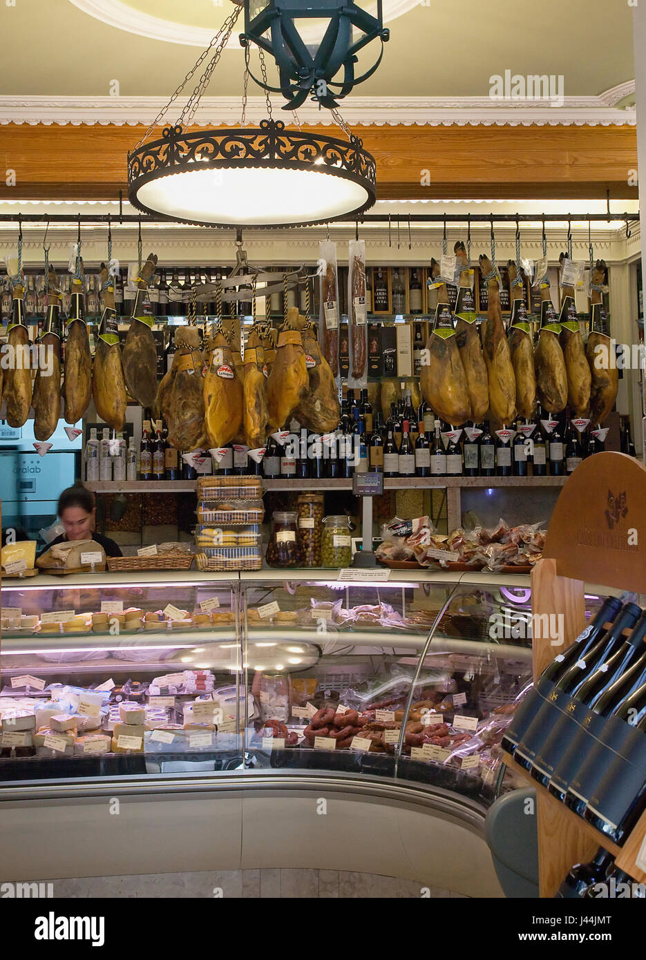 Portugal, Estredmadura, Lisbon, Baixa, Interior of delicatessen with hanging Presunto hams Stock Photo