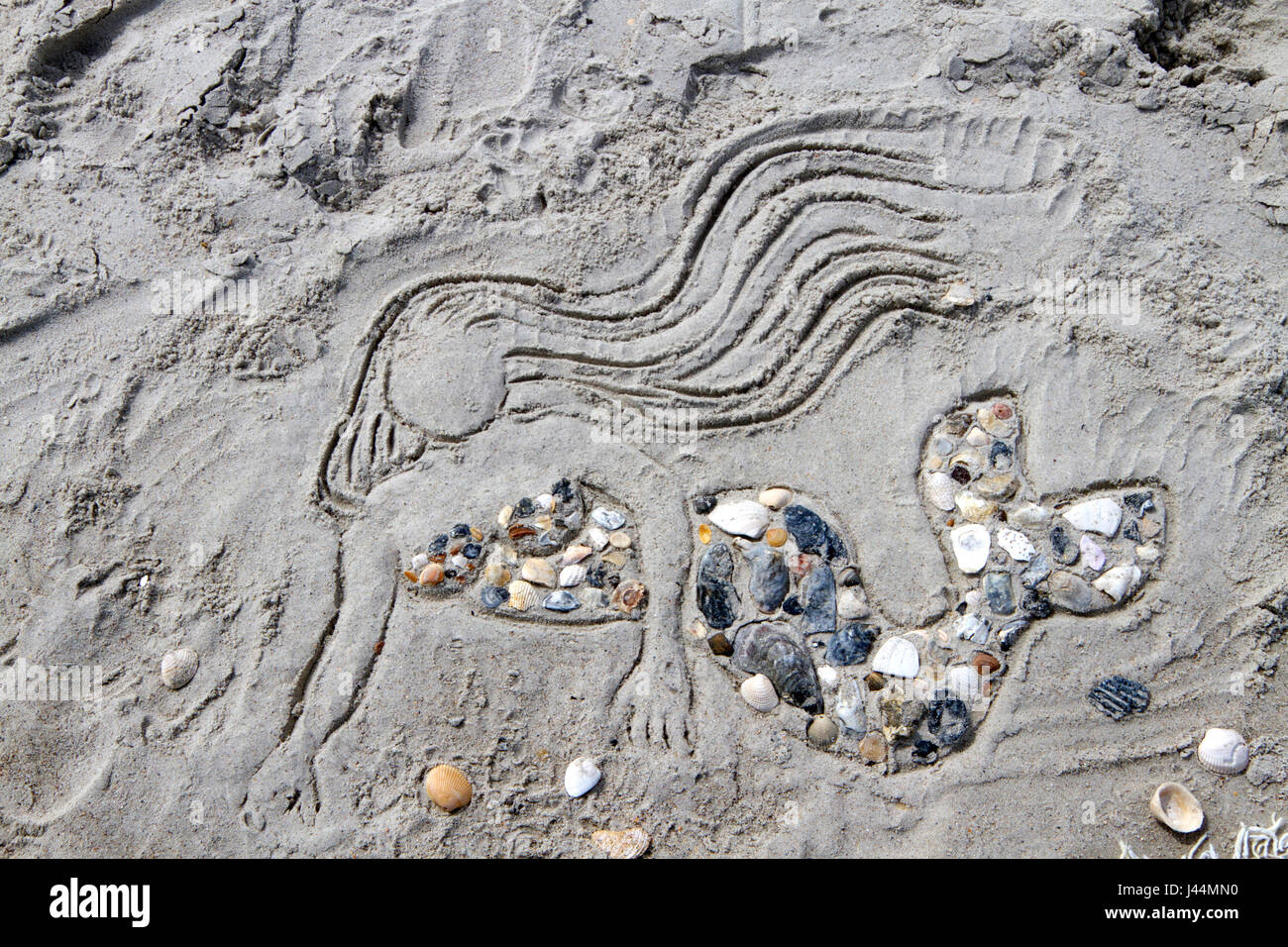 Mermaid Drawn in the Sand Stock Photo