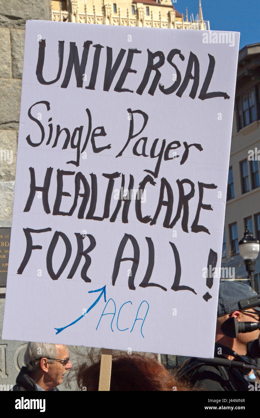 Asheville, North Carolina, USA - February 25, 2017: Large sign saying 'Universal Single Payer Healthcare For ALL' at an Obamacare (Affordable Care Act Stock Photo