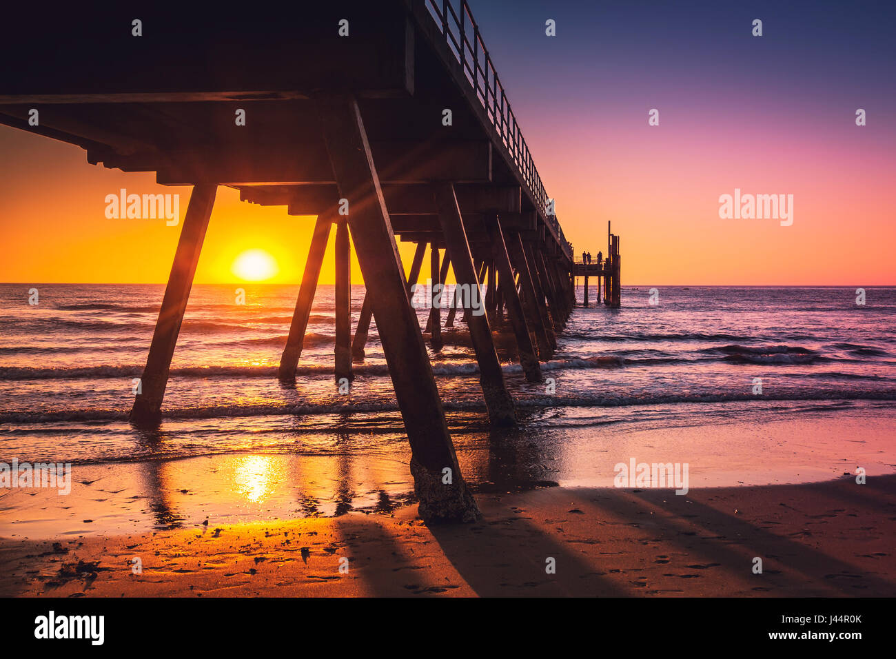 Glenelg beach jetty at sunset, Adelaide, South Australia Stock Photo