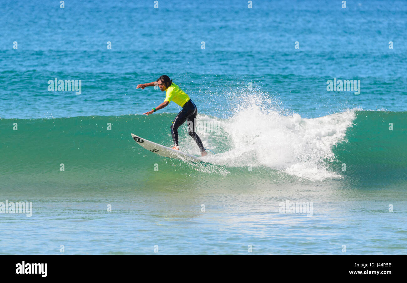 Young male competing in the Werri Slash Surf Competition, Gerringong, New South Wales, NSW, Australia Stock Photo