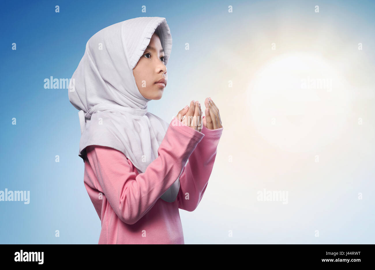 young muslim woman praying for Allah, muslim God Stock Photo - Alamy