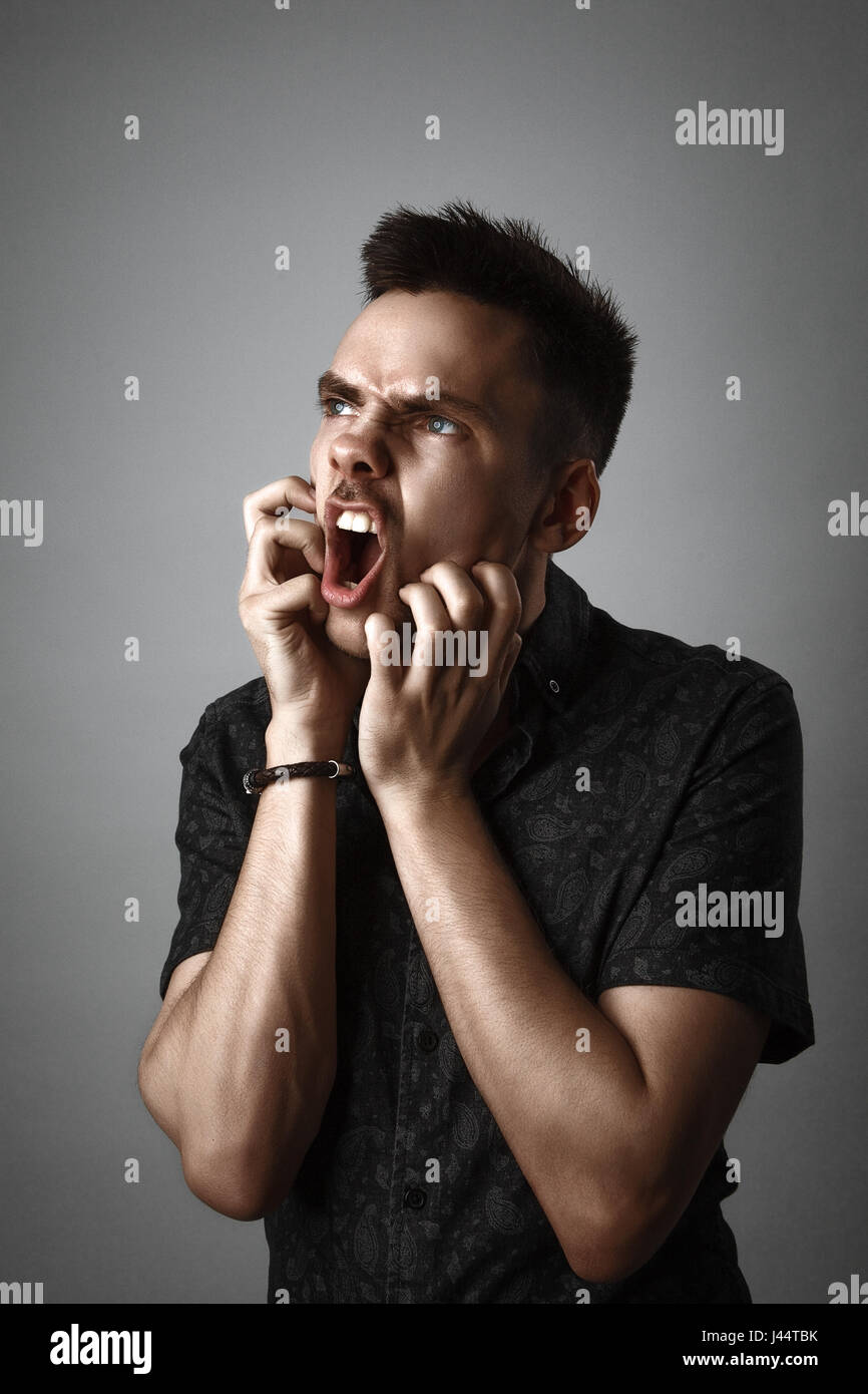 portrait of young angry man Stock Photo