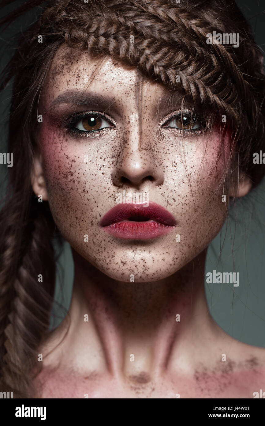 Beautiful strange girl with creative art make-up. Beauty face Stock Photo -  Alamy, image size:866x1390