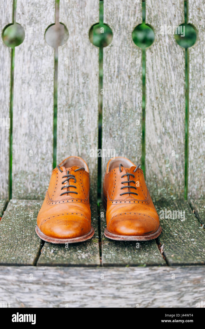 Shoes on wood deck background, outdoors Stock Photo