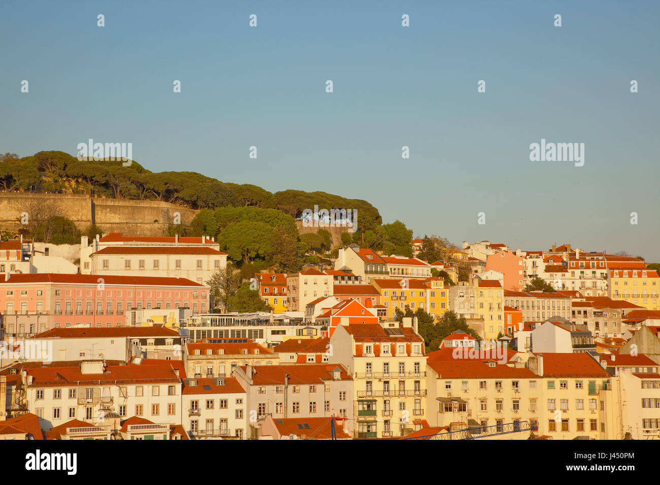 Portugal, Estredmadura, Lisbon, Bairro do Castello, Castelo de Sao Jorge, St Georges castle seen at sunset from Chiado. Stock Photo