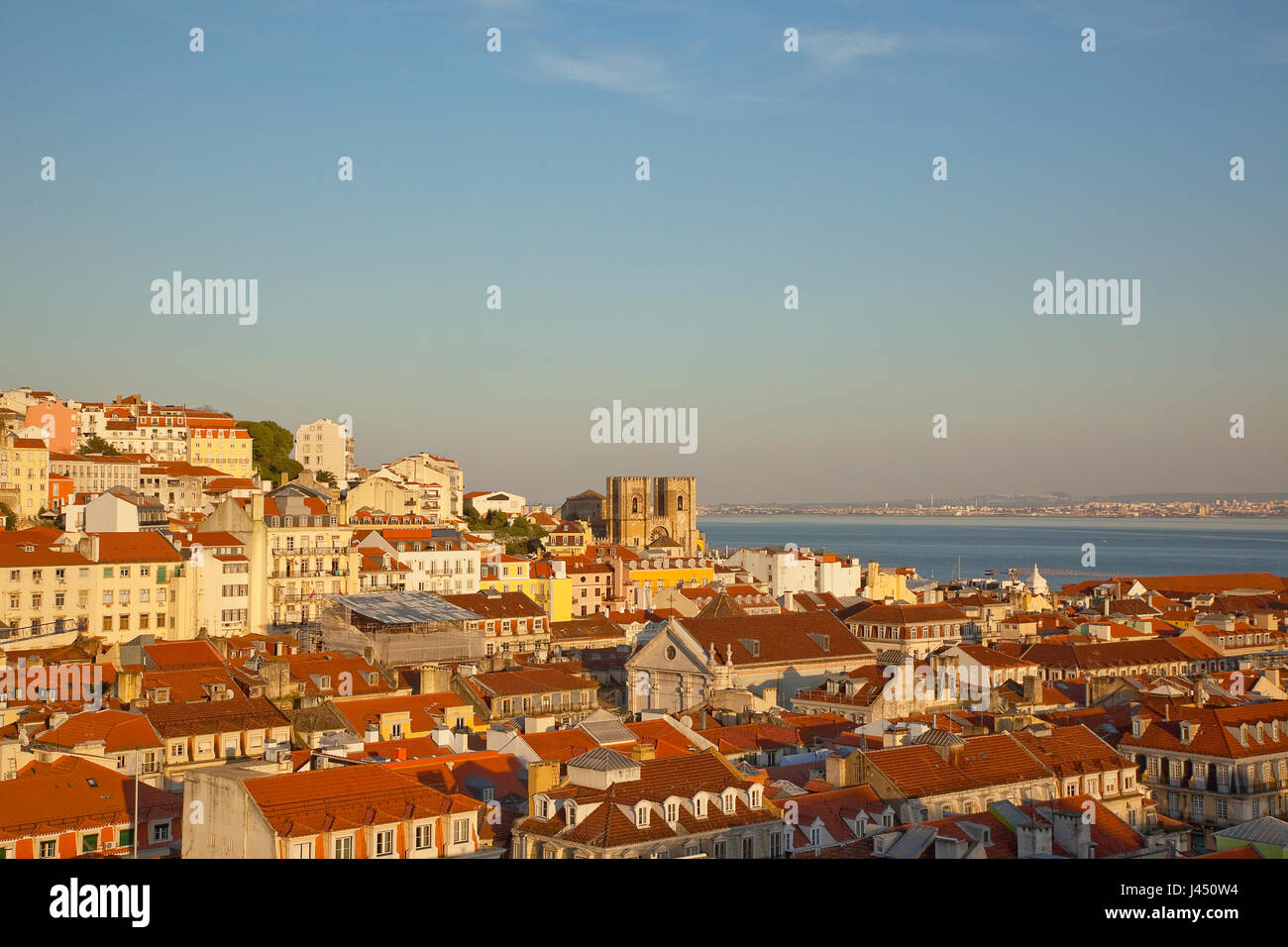 Portugal, Estredmadura, Lisbon, Alfama district, rooftops seen at sunset from Chiado. Stock Photo