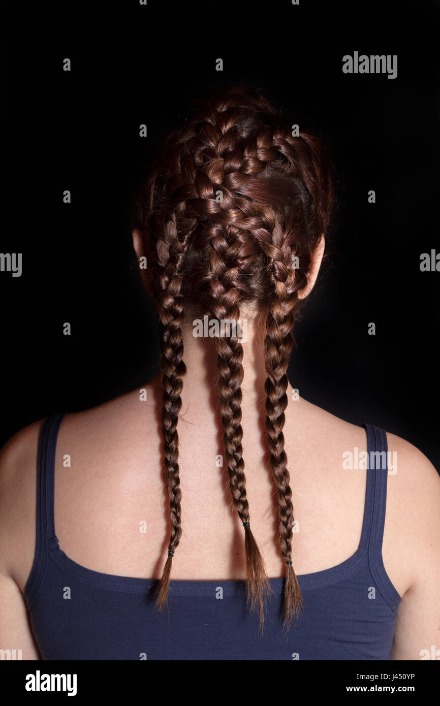 Rear view of edgy hairstyle with braids. Soft focus Stock Photo