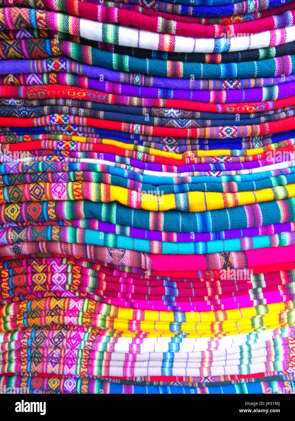 Multicolored Andean blankets in a market, La Paz, Bolivia Stock Photo