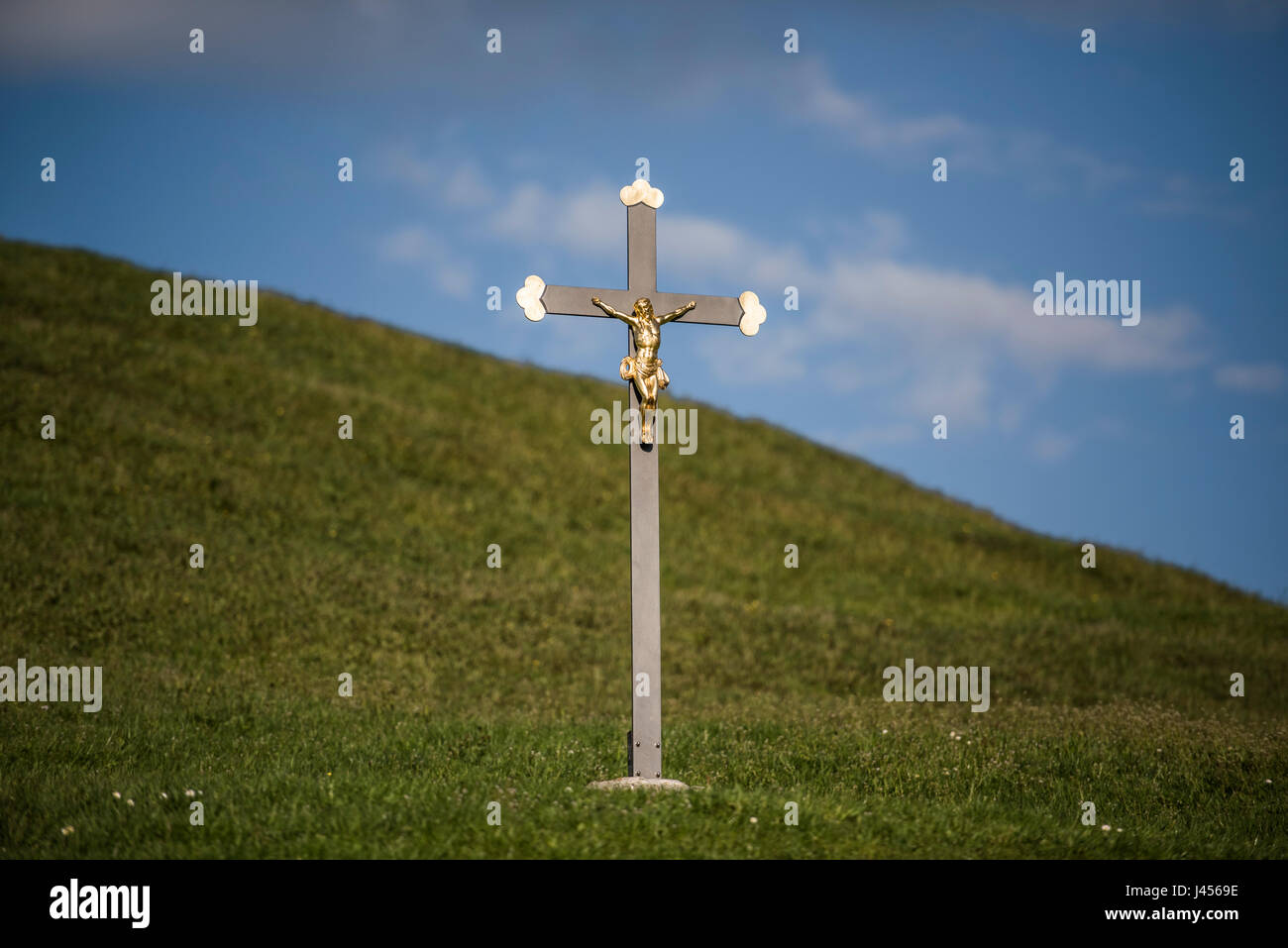 A Holy cross in a rural landscape of the area surrounding the Swiss town of Appenzell, Switzerland. Derek Hudson / Alamy Stock Photo Stock Photo