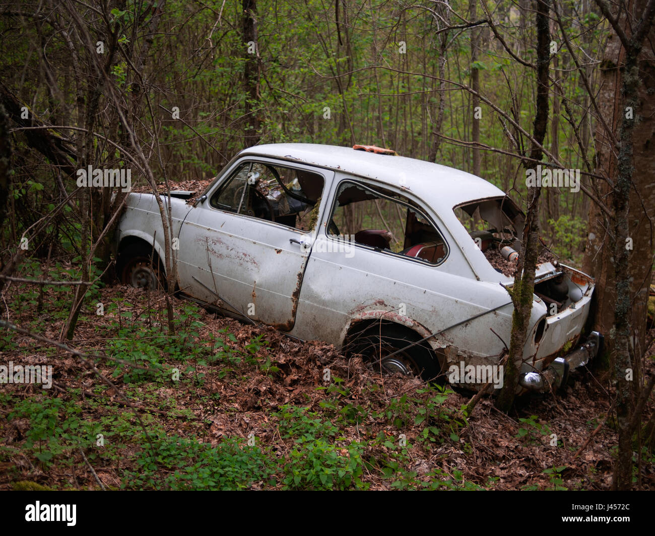 Old abandoned Fiat 850. Once someone's pride and joy. Stock Photo