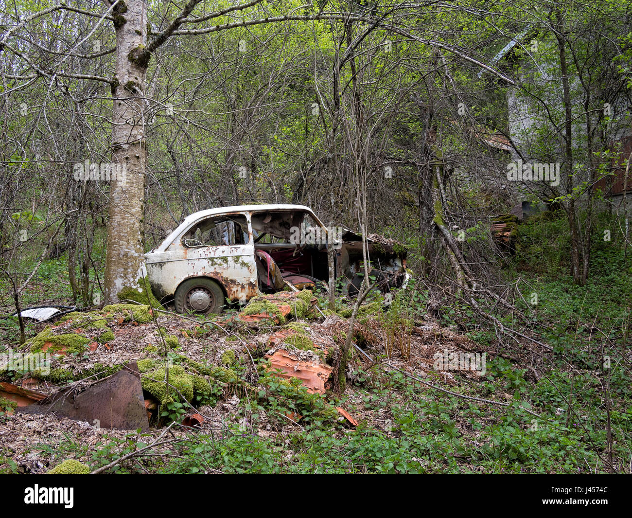 Old abandoned Fiat 850. Once someone's pride and joy. Stock Photo