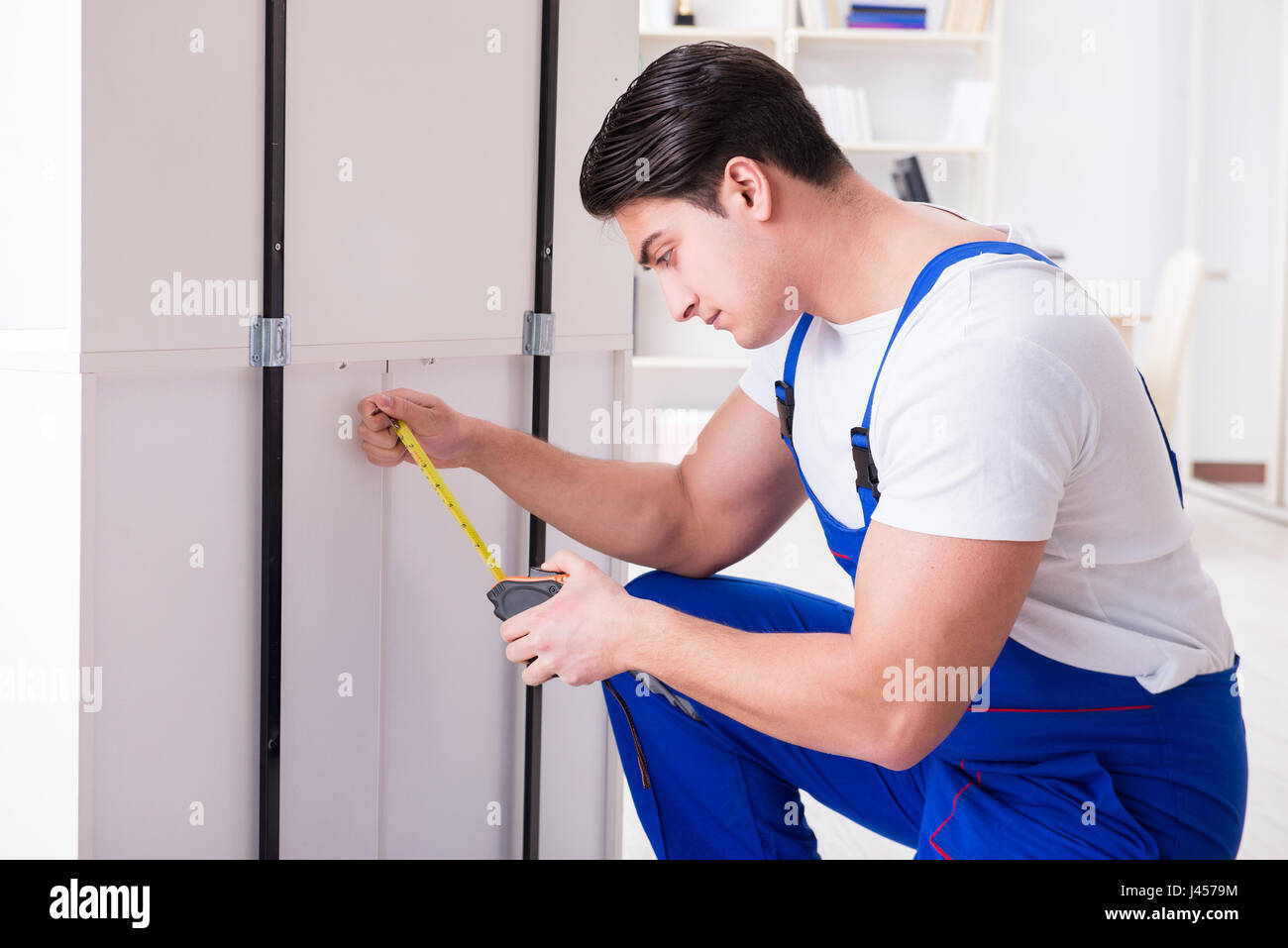 Furniture repair and assembly concept Stock Photo Alamy