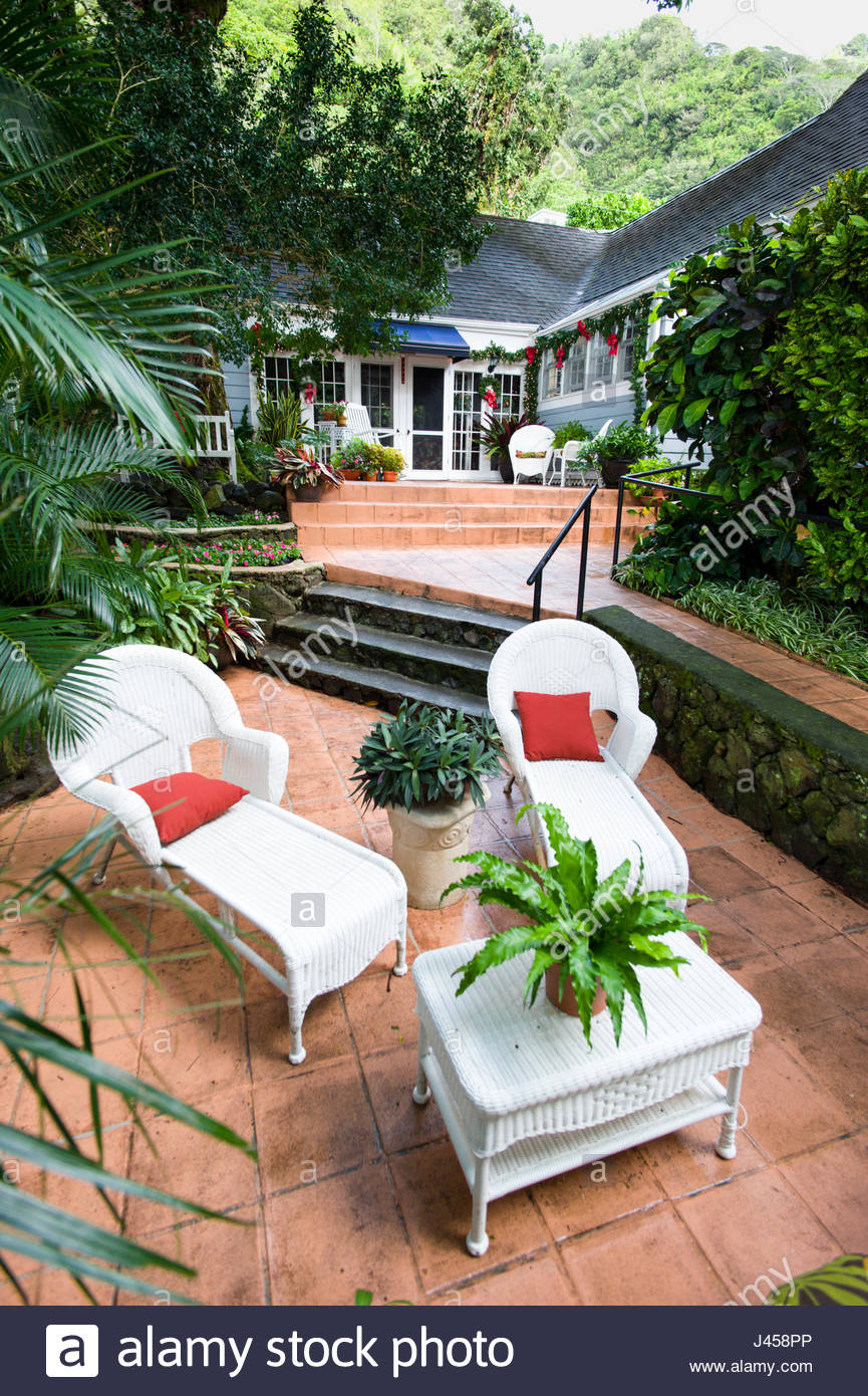 Wicker Lounge Chairs On Patio Of House Manoa Honolulu Oahu Stock Photo Alamy